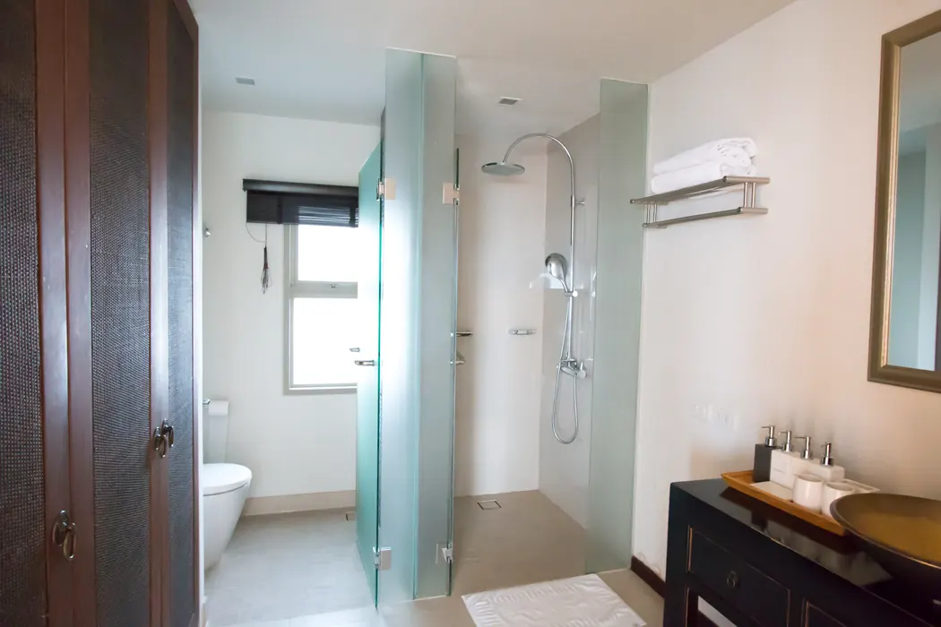 The ensuite bathroom in the Beachfront Pavilion, with its walk-in rain shower