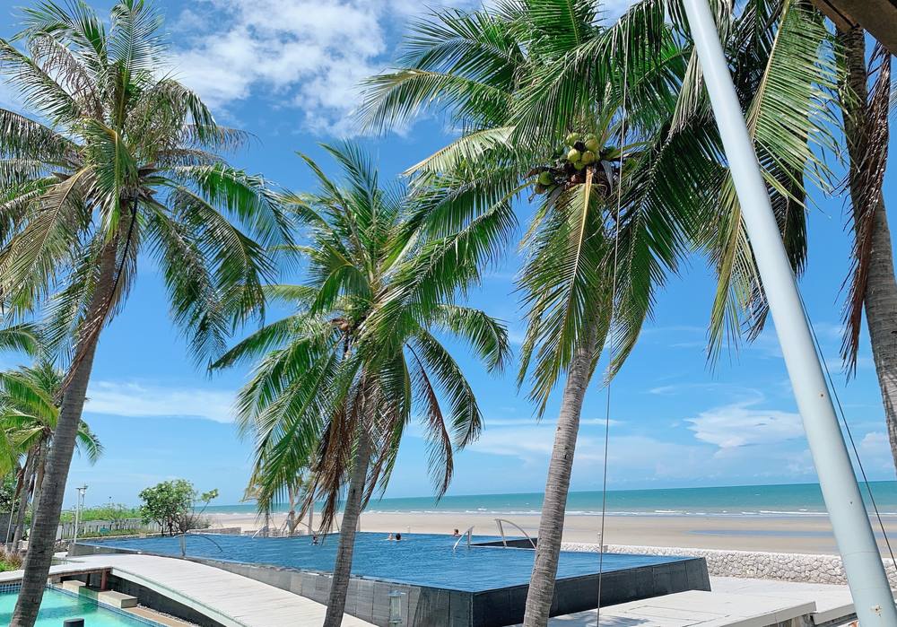 From the Beachfront Pavilion's private terrace, over the infinity pool to the beach